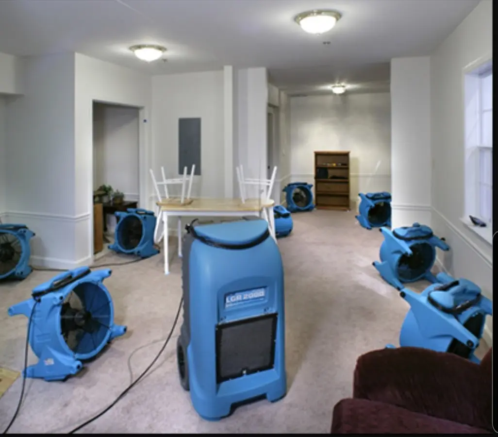 Air movers and dehumidifier setup for Water Damage Restoration in Mattapoisett